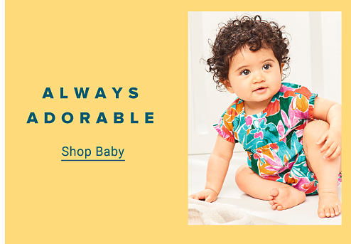  A baby in a floral suit. Always adorable. Shop baby.