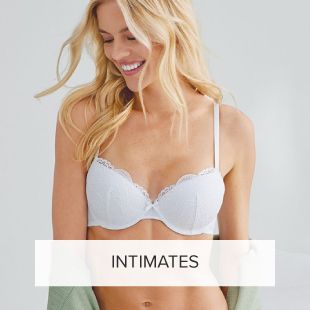 Image of woman in bra. Shop intimates.