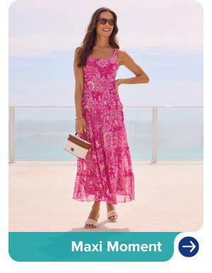 Image of a woman wearing a maxi dress. Maxi moment.