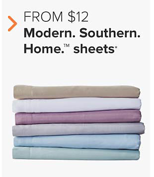 Stacks of folded sheets in gray, white, purple, light gray, light blue and blue green. From $12 Modern Southern Home sheets. 