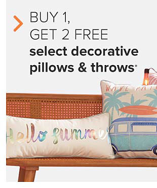 A pillow that says hello summer and another with a van with a surfboard on top. Buy one, get two free select decorative pillows and throws.