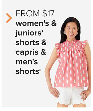 A woman in a pink and white top and white shorts. From $17 women's and juniors' shorts and capris and men's shorts. 