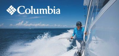 An image of a man on a boat wearing Columbia apparel. The Columbia logo.