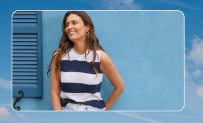 A woman in a blue and white striped top. Styles for every sunny day.