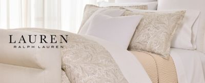 A bedding set in tan and white.