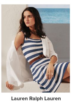A woman in a blue and white striped dress. Lauren Ralph Lauren.