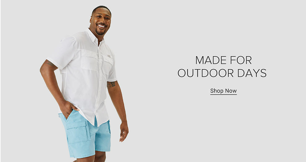Man wearing a white shirt and light blue shorts. Made for outdoor days. Shop Now. 