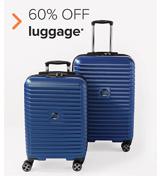 Two blue hardsided rolling luggage pieces. 60% off luggage. 