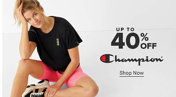 An image of a woman in a black Champion tee and pink Champion shorts. Up to 40% off Champion. Shop now.