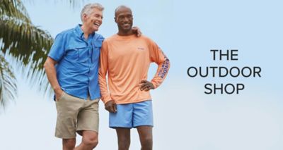 One man in a blue fishing shirt and khaki shorts. Another man in a long-sleeve orange sun shirt. The outdoor shop. 
