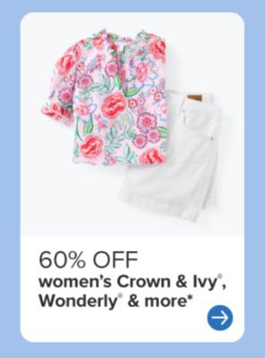 A floral top and white shorts. 60% off women's Crown and Ivy, Wonderly and more.