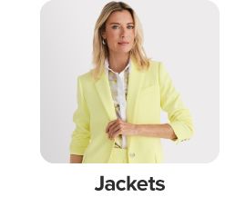 Image of a woman wearing a yellow jacket. Jackets.