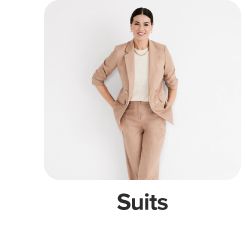 Image of a woman wearing a suit. Suits.
