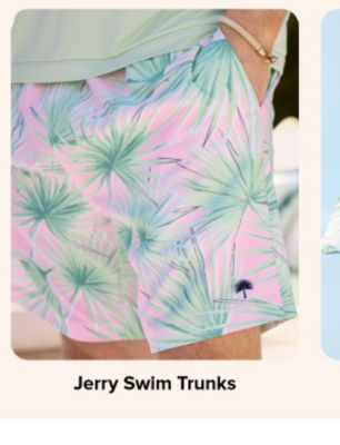 A closeup image of a man wearing swim shorts. Jerry Swim Trunks.