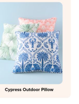 An image of three throw pillows. Cypress outdoor pillow.