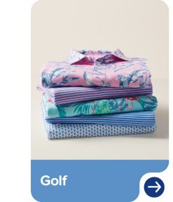 An image of a stack of folded golf shirts. Golf. 