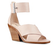 A Nine West strapped wedge shoe shop shoes.