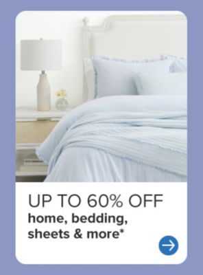 Up to 60% off home, bedding, sheets & more. White bedding set with pillows.