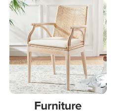 An image of a chair on a rug. Furniture. 