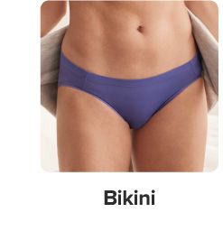 An image of a woman in a purple bikini panty. Shop bikini.