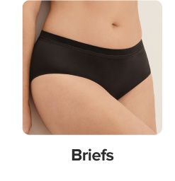 An image of a woman in a black brief panty. Shop briefs.