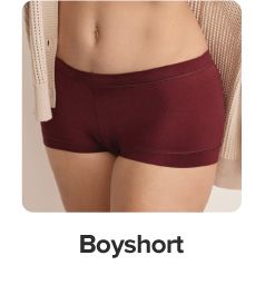 An image of a woman in burgundy boy shorts. Shop boy short.