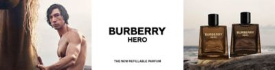 Adam Driver without a shirt touching a horse. Burberry Hero The new refillable parfum. Two Burberry Hero bottles on a rock in front of the ocean.