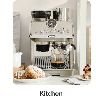 An espresso machine. Shop kitchen.