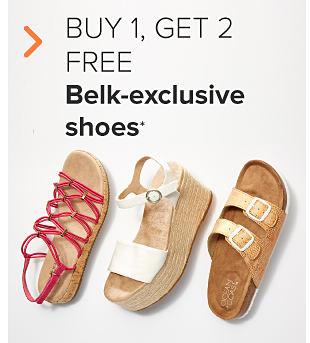 Three pairs of women's sandals. One has red straps, one white, and one gold. Buy 1, get two free Belk-exclusive shoes. 