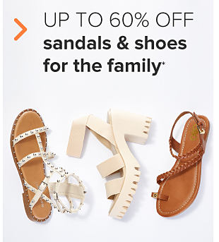 A sandal with white bejeweled straps, a white sandal with a big platform heel, and a brown sandal with a toe strap. Up to 60% off sandals and shoes for the family.