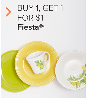Yellow and green plates, and a white plate and mug with lemons on them. Buy 1, get 1 for a dollar Fiesta.