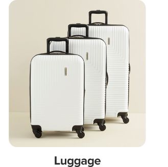 An image of white rolling luggage. Shop luggage.