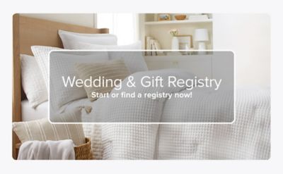 An image of a bed with white bedding. Wedding and gift registry. Start or find a registry now!