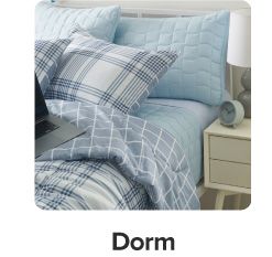 A blue bedding set. Shop dorm.