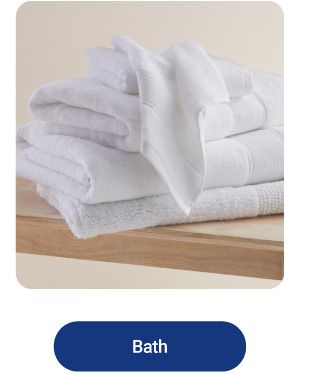 An image of folded towels. Shop bath.