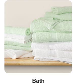A set of green and white bath towels. Shop bath.