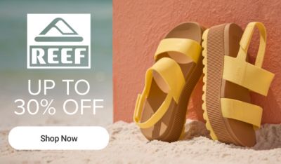 Reef logo. Up to 30% off. Shop now. A pair on sandals on the beach leaning against a wall.