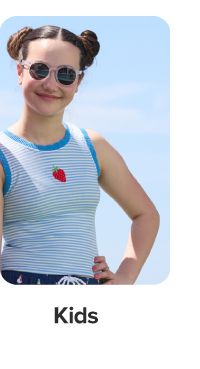 A girl in a blue tank top. Shop kids.