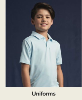 A boy in a light blue polo. Shop uniforms.
