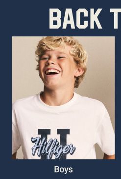 A young boy in a white t-shirt. Boys. 
