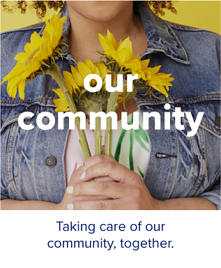 A woman in a denim jacket holding flowers. Our community. Taking care of our community, together.