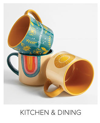 An image of three coffee mugs featuring different designs and colors. Shop kitchen and dining.