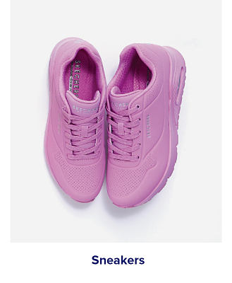 A pair of pink fashion sneakers. Shop sneakers.