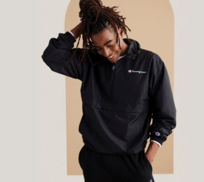 A man in a black Champion hoodie. The active shop.