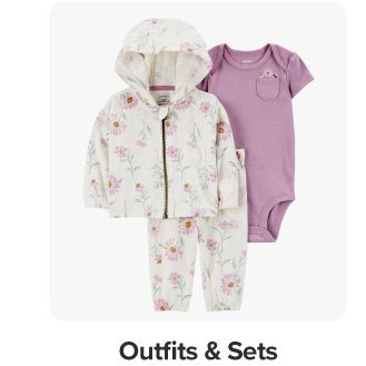 Image of a floral white set and purple onesie. Shop outfits and sets. 