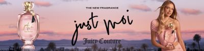 The new fragrance. Just Moi. Juicy Couture. A woman holding a large bottle of perfume in front of a landscape.