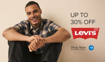 Up to 30% off Levi’s. Levi’s logo. Shop now. A man wearing Levi’s apparel.