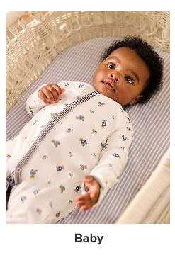 A baby in a Polo onesie. Shop baby.