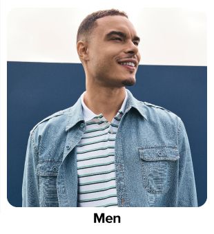 Man in denim shirt over striped tee. Shop men.