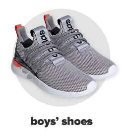 A pair of grey slip on athletic sneakers. Boys' shoes. 